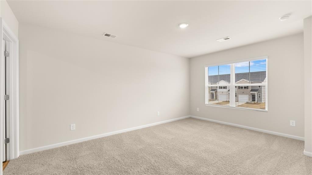121 Kenmore Circle Perry, GA 31069 - Photo 16 of 28 a view of an empty room with a window