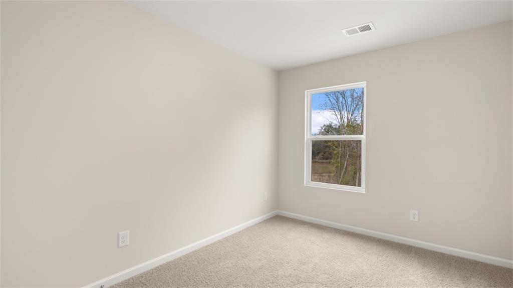 121 Kenmore Circle Perry, GA 31069 - Photo 22 of 28 an empty room with a window