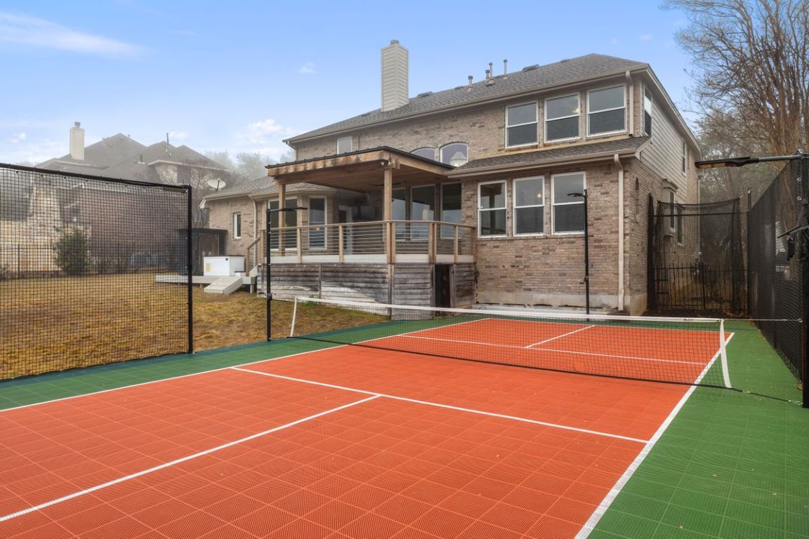 2137 Rivina Drive Austin, TX 78733 - Photo 36 of 39 View of sport court with basketball court and a tennis court