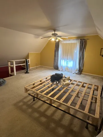 a room with gym equipment and a mirror