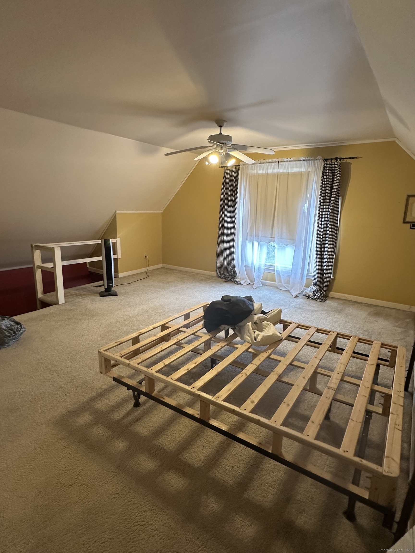 421 Main Street Wallingford, CT 06492 - Photo 13 of 27 a room with gym equipment and a mirror