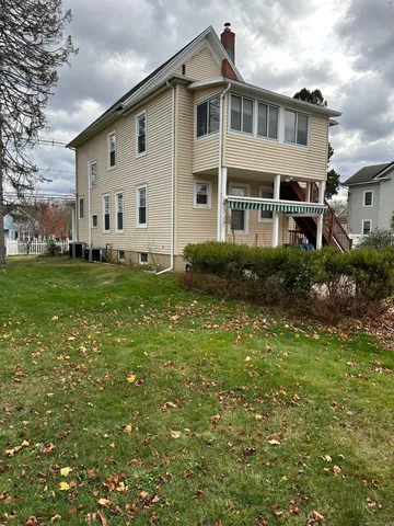 a view of a house with a garden