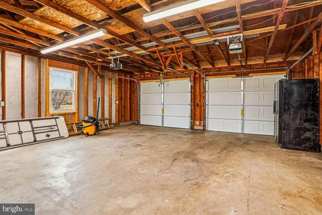a view of a room with wooden walls