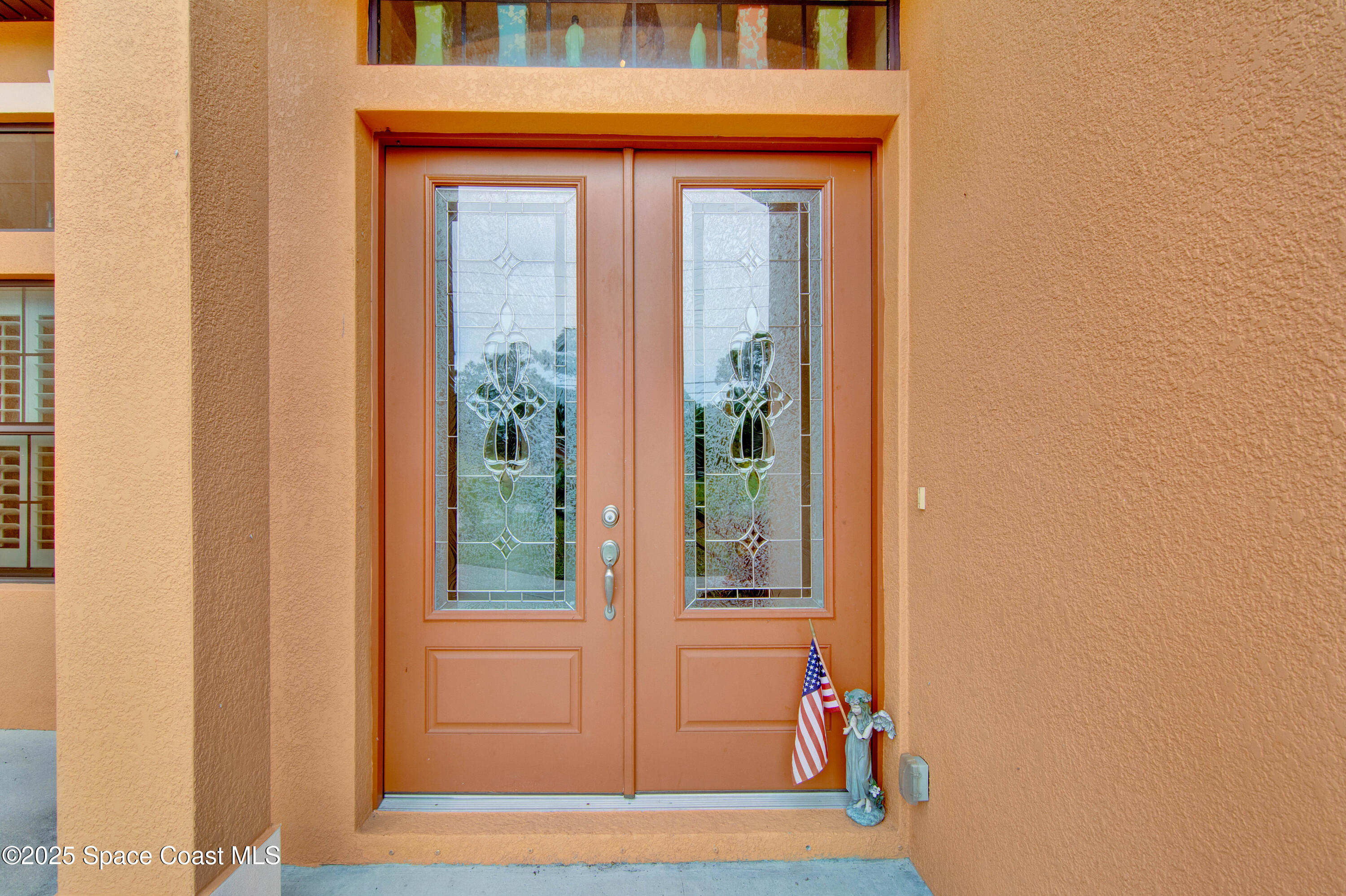 900 Hall Road Malabar, FL 32950 - Photo 3 of 28 a view of front door of a house