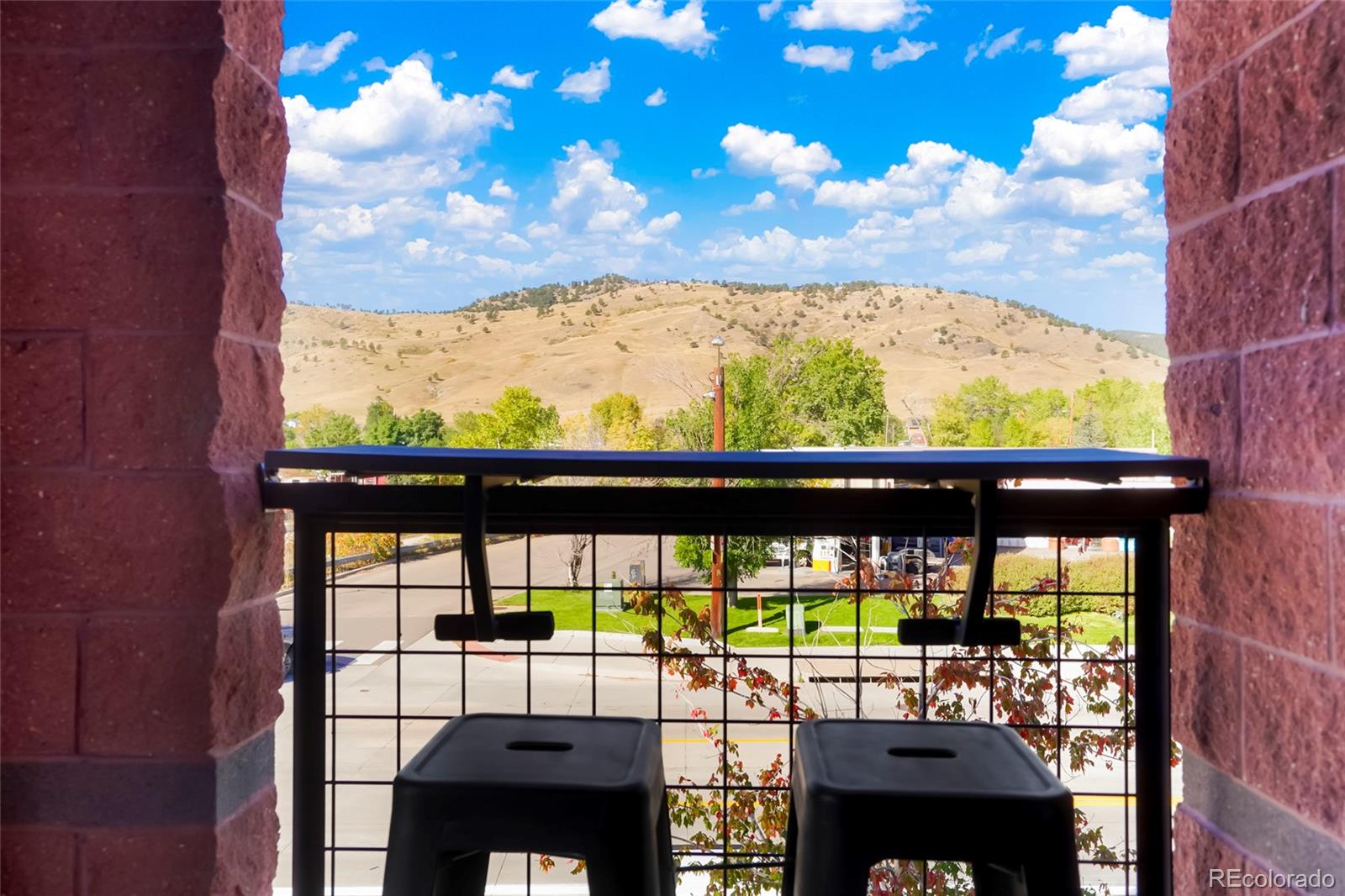 4520 Broadway, Unit 207 Boulder, CO 80304 - Photo 12 of 28 a view of a chairs and table in the balcony