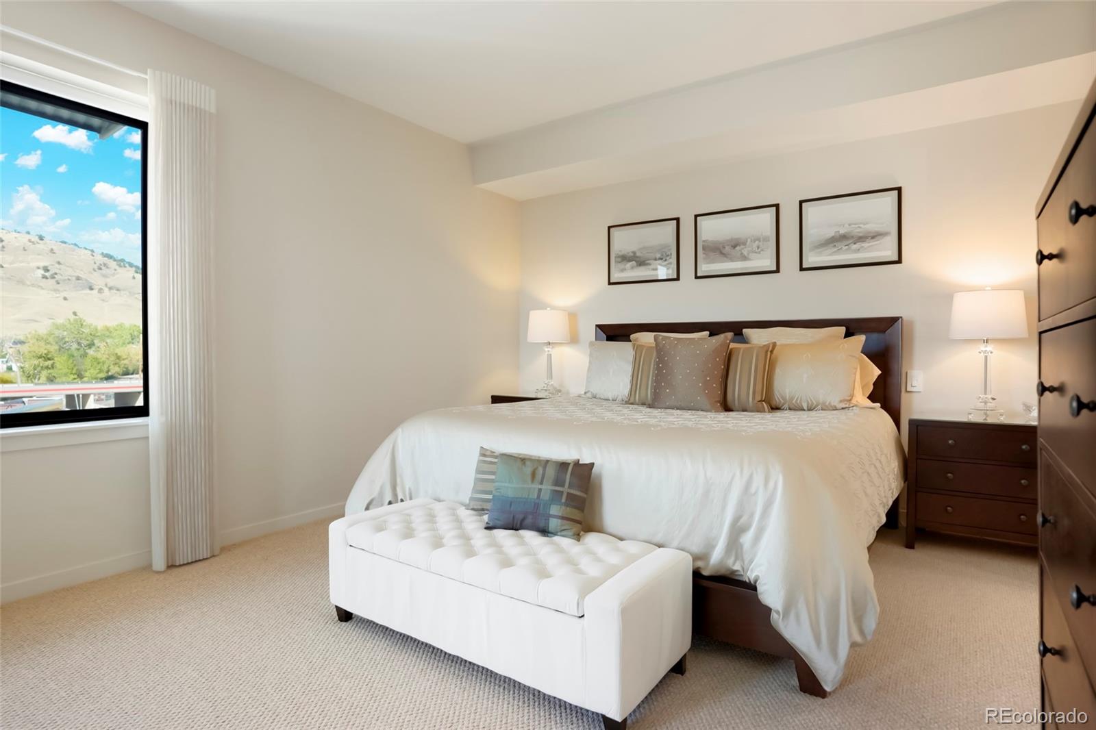 4520 Broadway, Unit 207 Boulder, CO 80304 - Photo 20 of 28 a bedroom with a bed and a large window