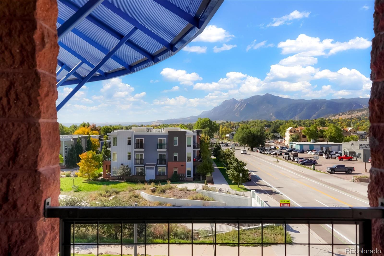 4520 Broadway, Unit 207 Boulder, CO 80304 - Photo 22 of 28 a view of a city from a balcony