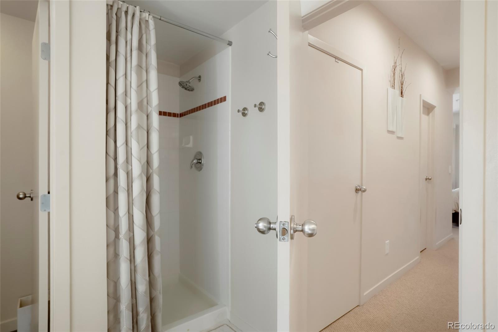 4520 Broadway, Unit 207 Boulder, CO 80304 - Photo 24 of 28 a bathroom with a shower