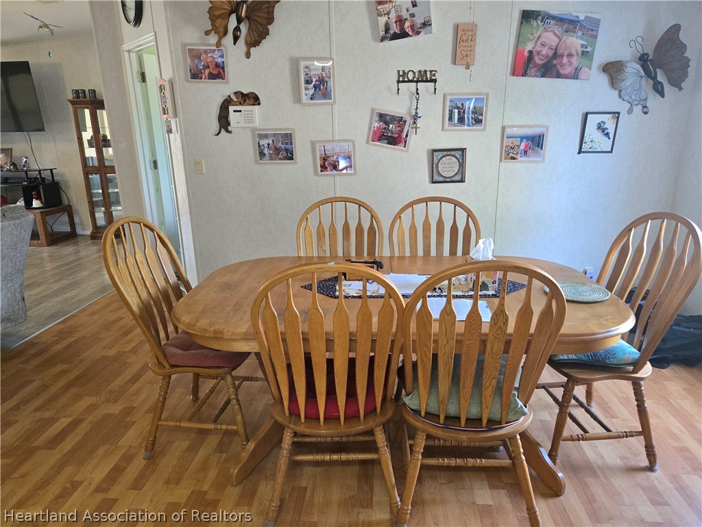 504 Thunderbird Hill Road Sebring, FL 33872 - Photo 12 of 35 a view of a chairs and table in a room