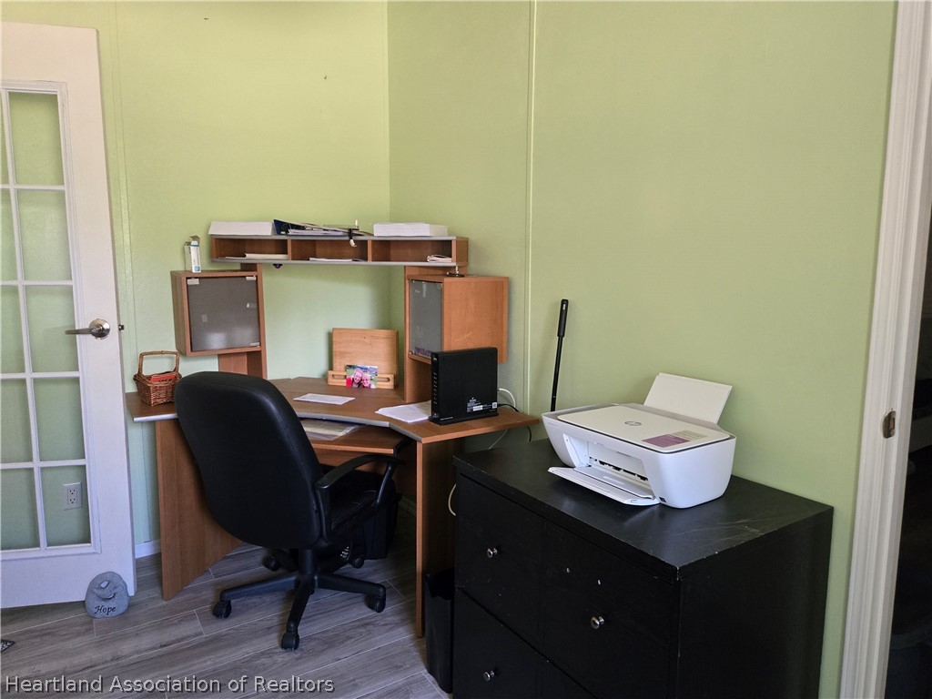 504 Thunderbird Hill Road Sebring, FL 33872 - Photo 18 of 35 a view of a workspace with furniture