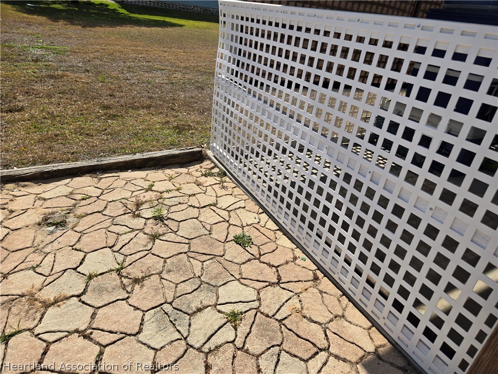 504 Thunderbird Hill Road Sebring, FL 33872 - Photo 34 of 35 a view of a black and white checkered floor
