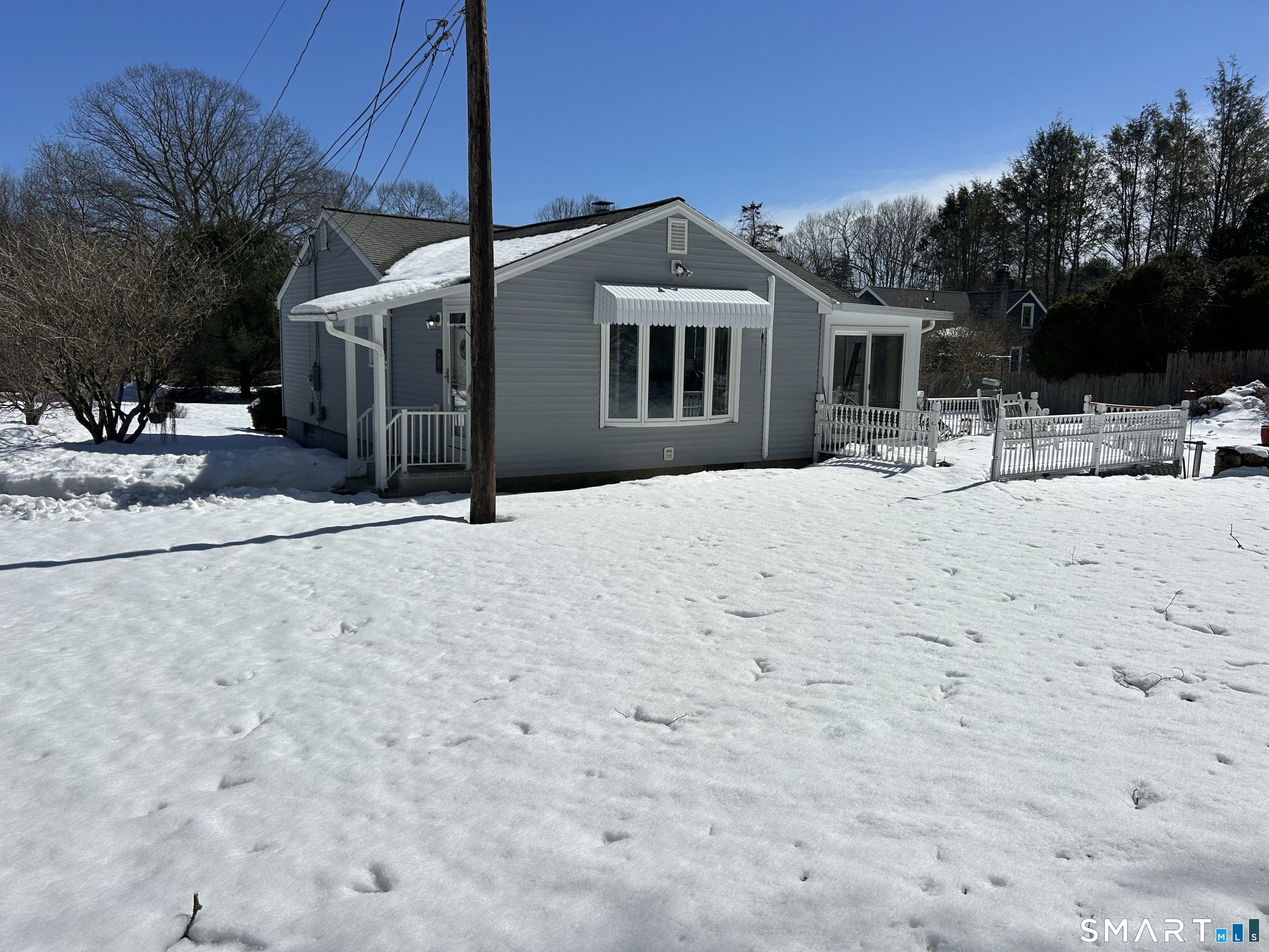 783 Buddington Road Groton, CT 06340 - Photo 3 of 35 a front view of house with yard