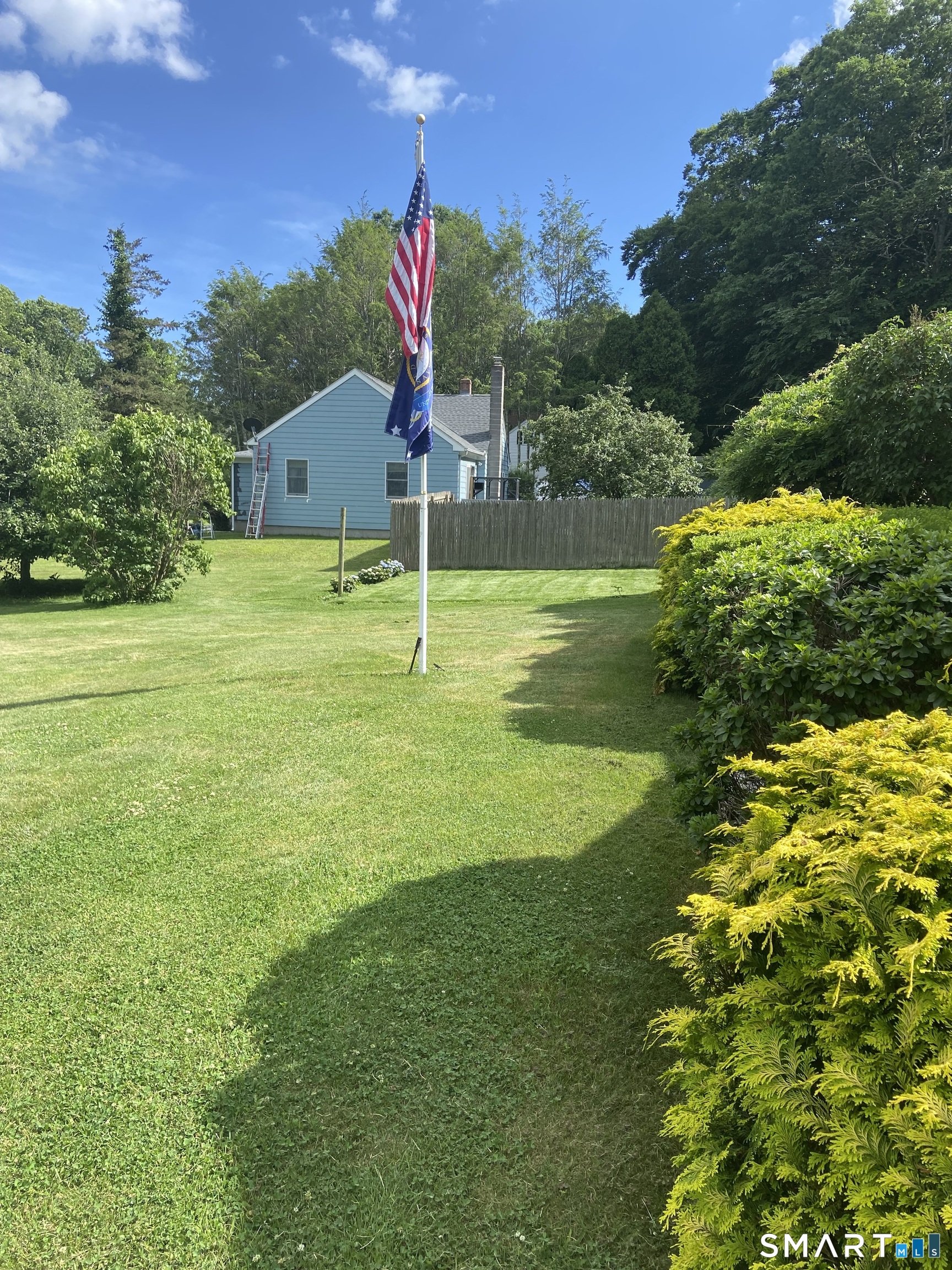 783 Buddington Road Groton, CT 06340 - Photo 33 of 35 a view of a golf course with a lake