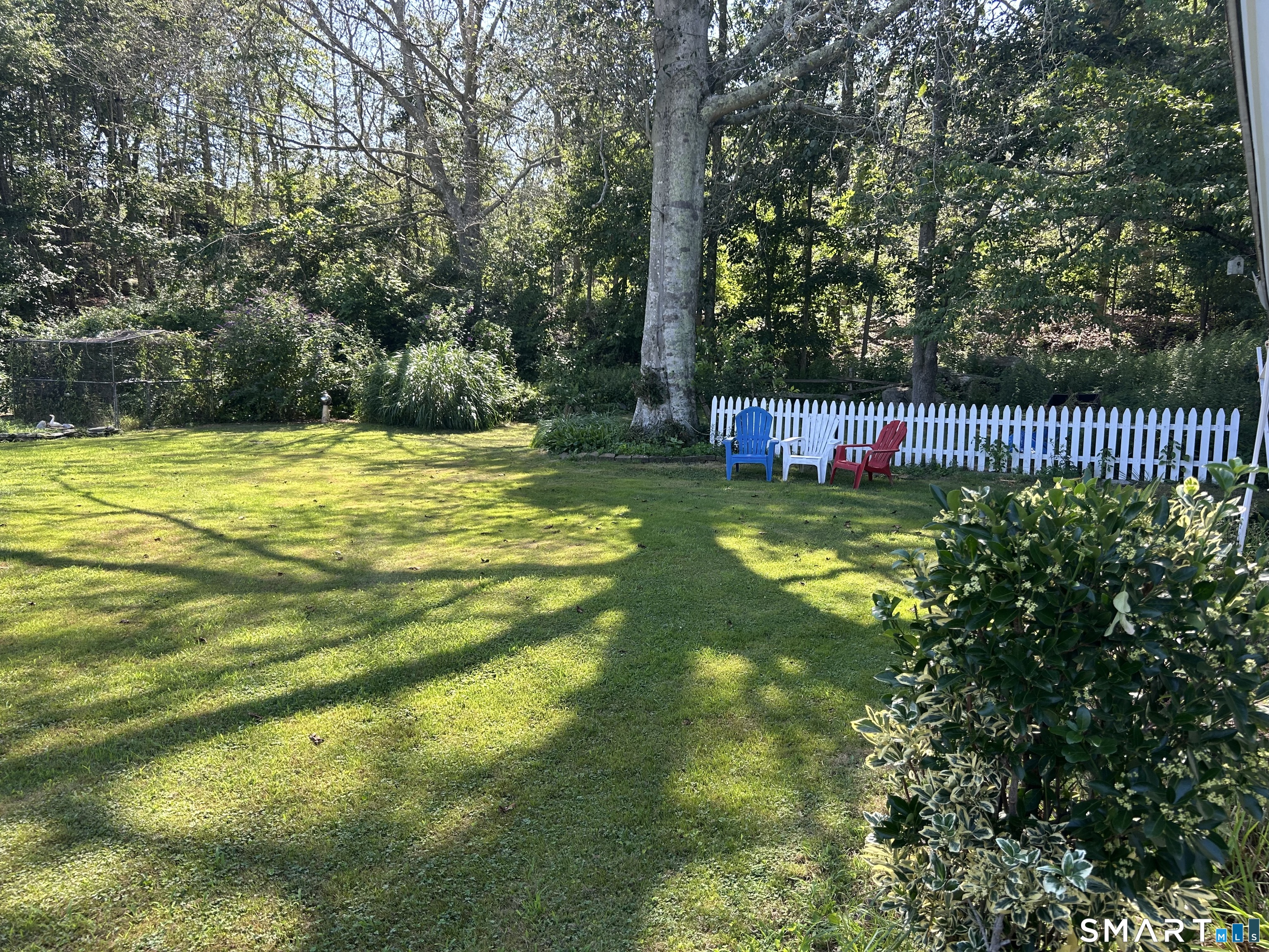 783 Buddington Road Groton, CT 06340 - Photo 35 of 35 a view of a golf course with a swimming pool