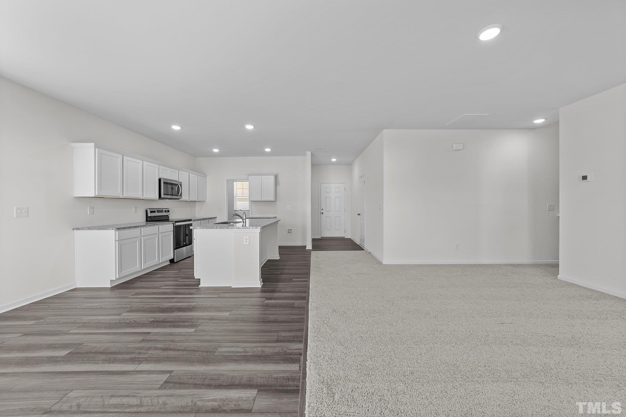 200 Miles Drive Pikeville, NC 27863 - Photo 15 of 34 a view of kitchen with furniture and wooden floor