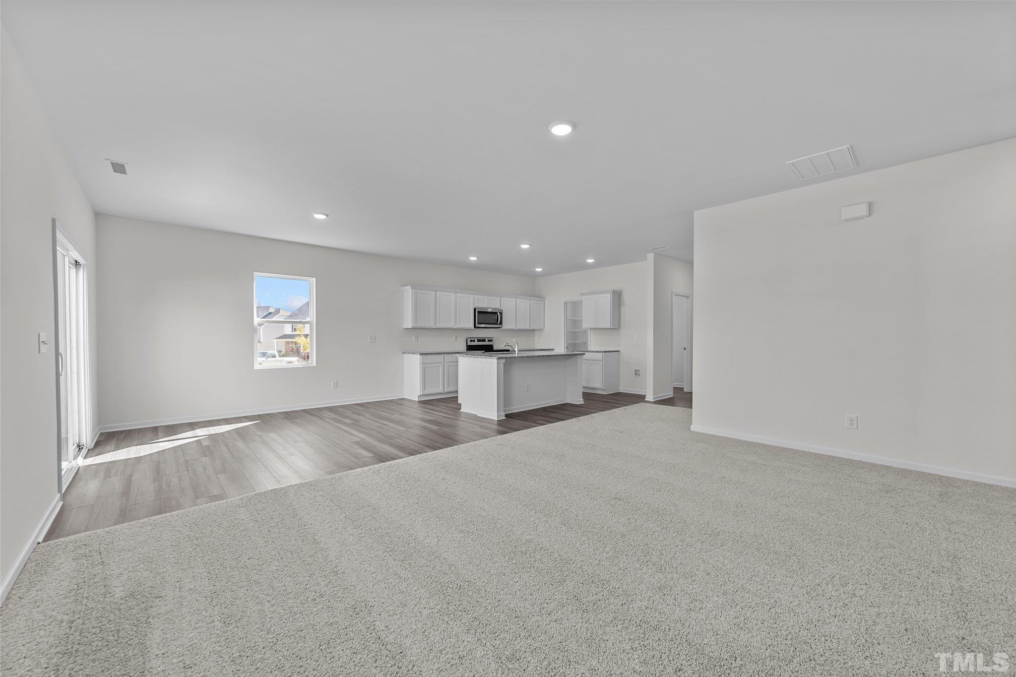 200 Miles Drive Pikeville, NC 27863 - Photo 16 of 34 a view of a kitchen with a sink and a window