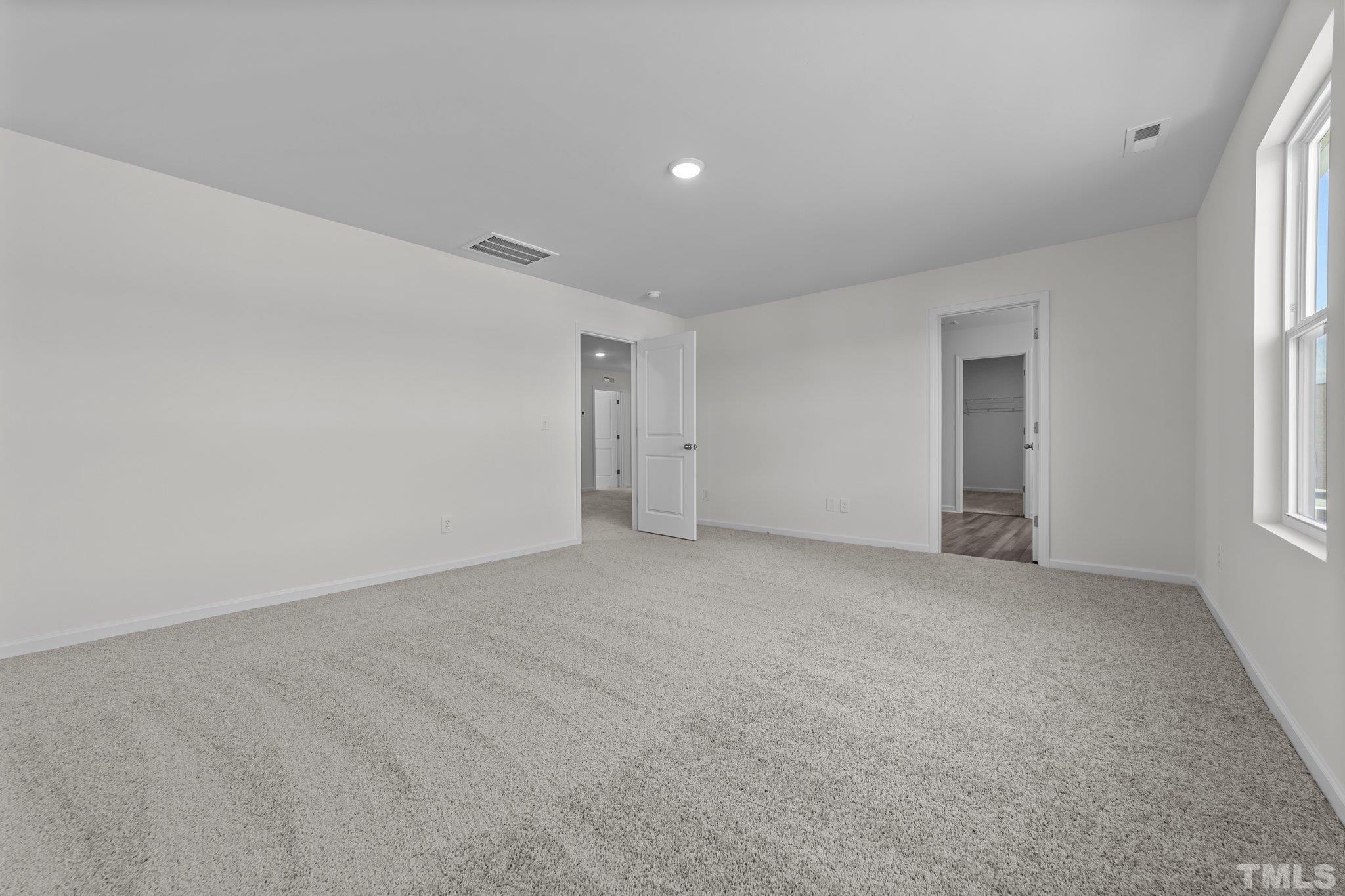 200 Miles Drive Pikeville, NC 27863 - Photo 22 of 34 a view of an empty room with a window