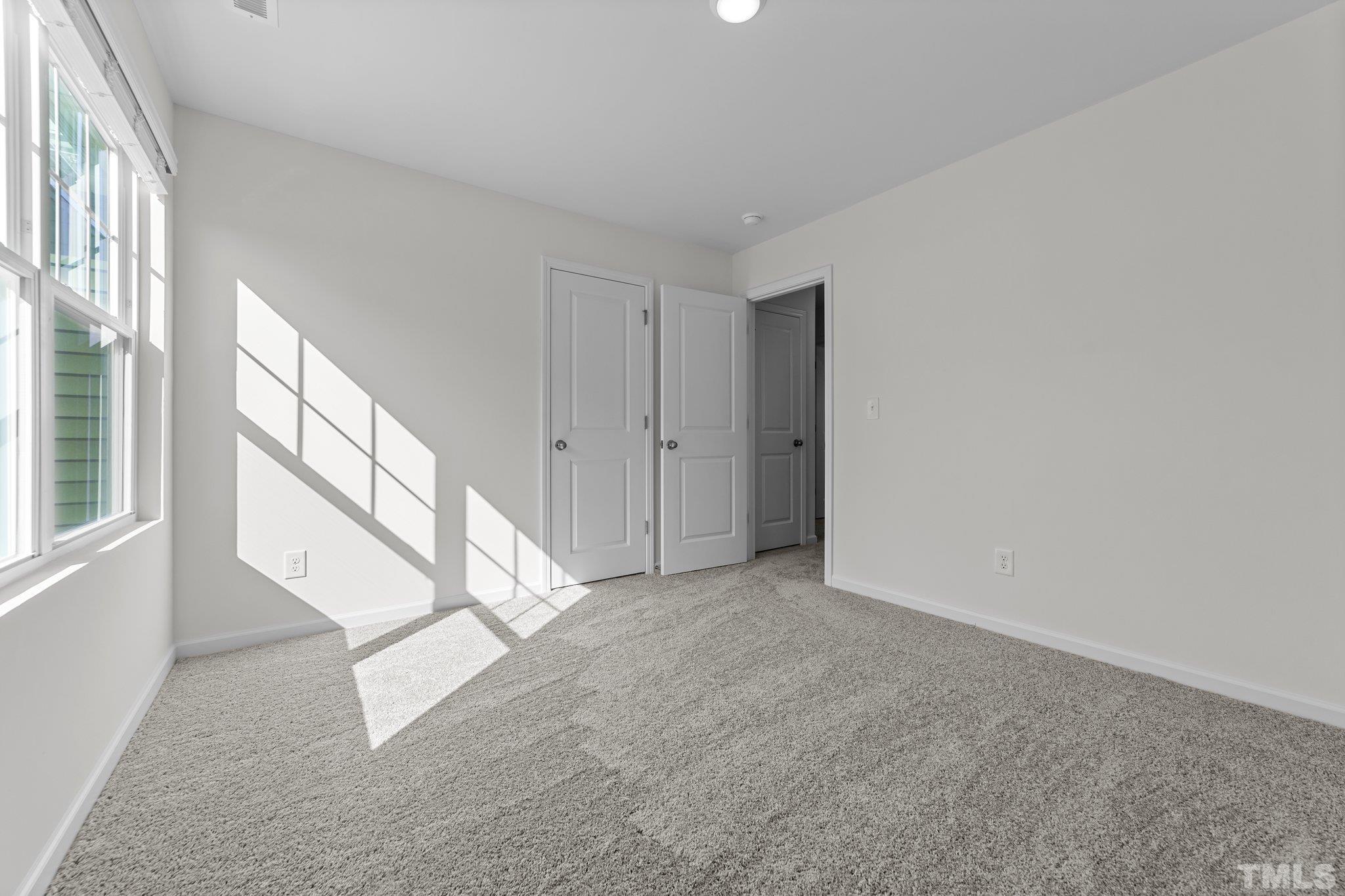 200 Miles Drive Pikeville, NC 27863 - Photo 27 of 34 a view of an empty room with a window