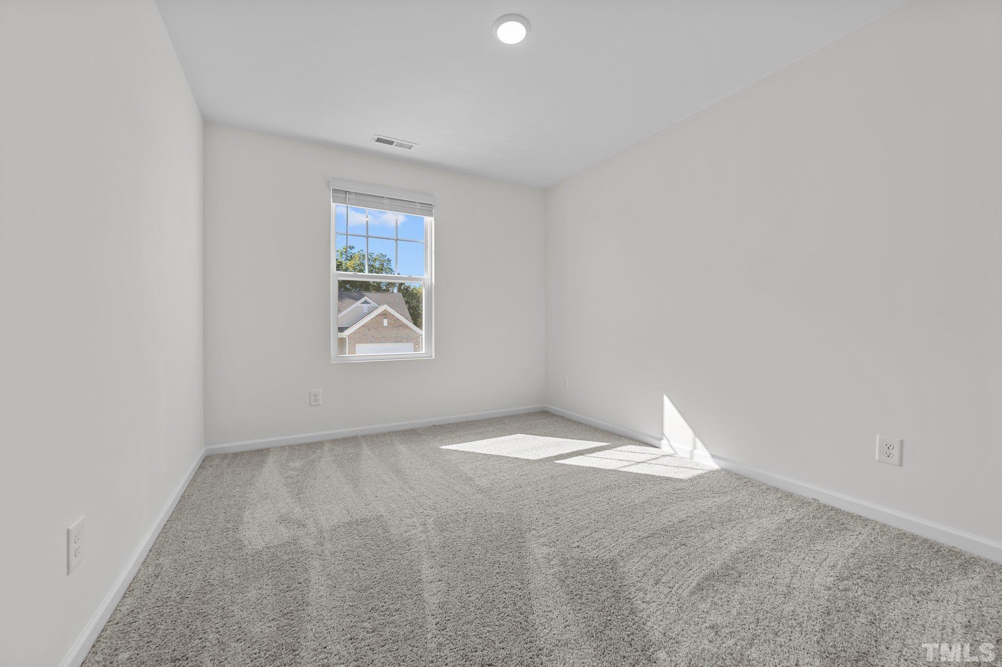 200 Miles Drive Pikeville, NC 27863 - Photo 30 of 34 a view of an empty room and a window