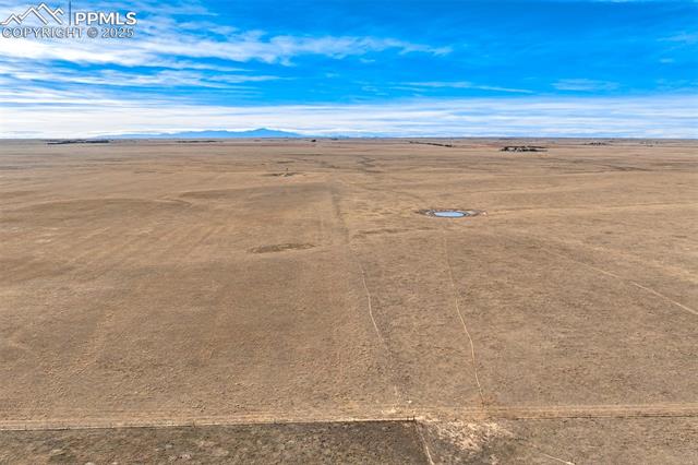 Oil Well Road Rush, CO 80833 - Photo 9 of 30 Overview of rural landscape with a desert landscape and a mountainous background