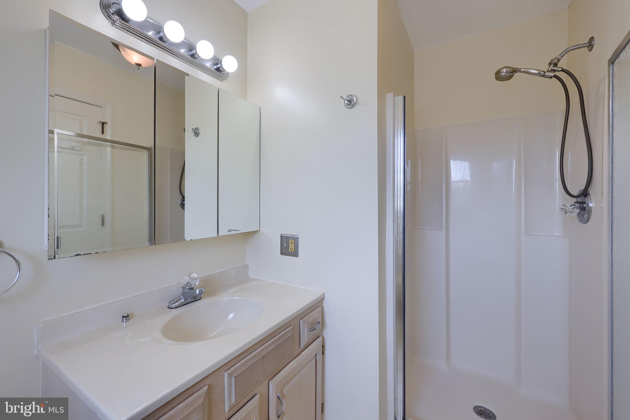 142 Palm Lane Lebanon, PA 17042 - Photo 29 of 38 a bathroom with a sink double vanity granite tub and shower