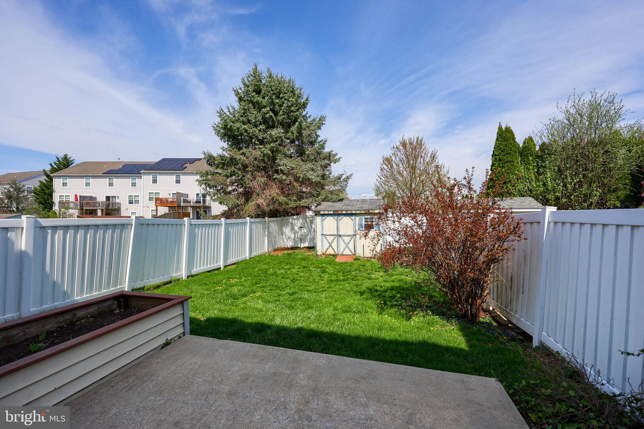 142 Palm Lane Lebanon, PA 17042 - Photo 35 of 38 a view of a backyard with wooden fence
