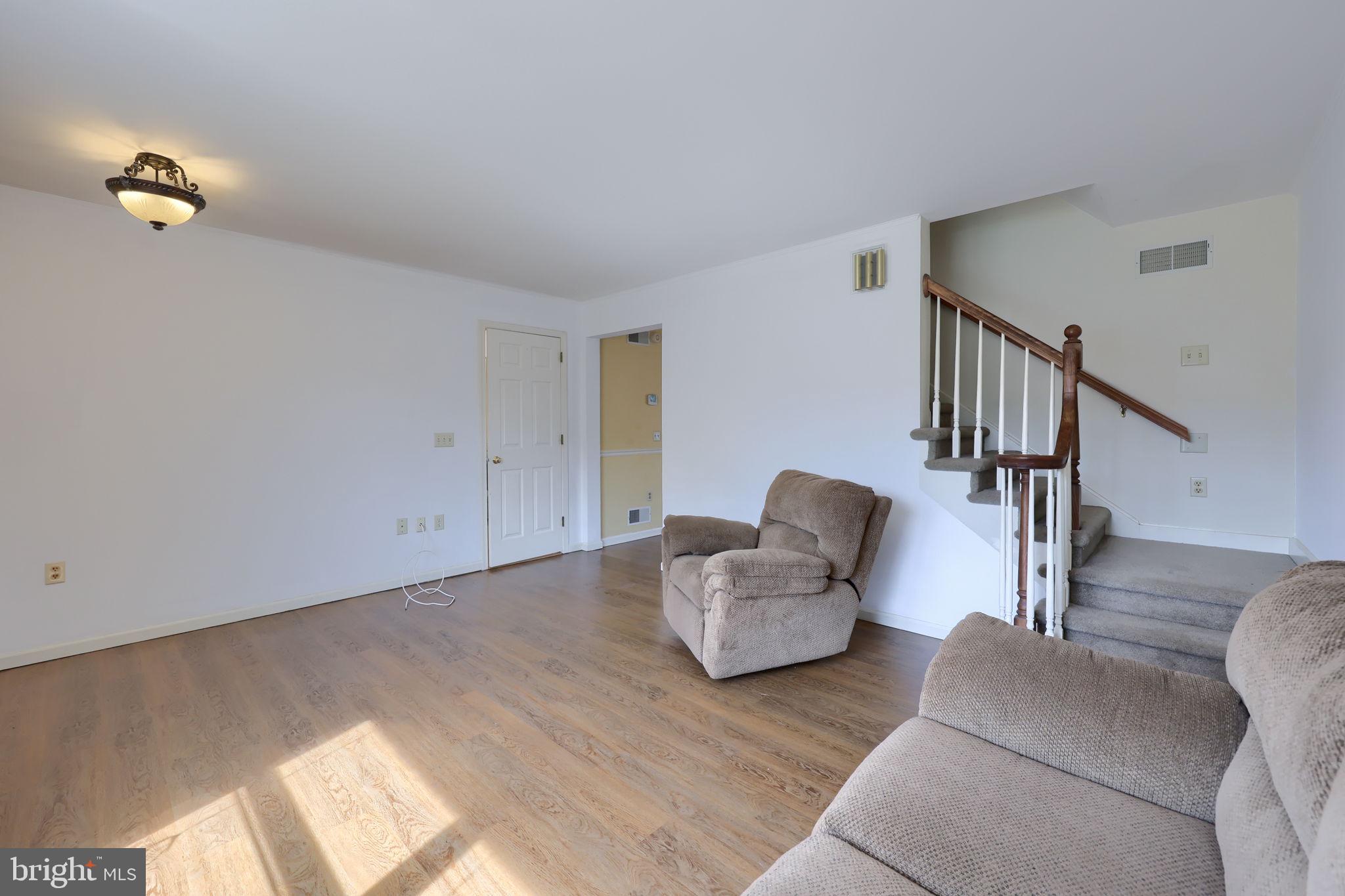 142 Palm Lane Lebanon, PA 17042 - Photo 7 of 38 a living room with furniture and stairs