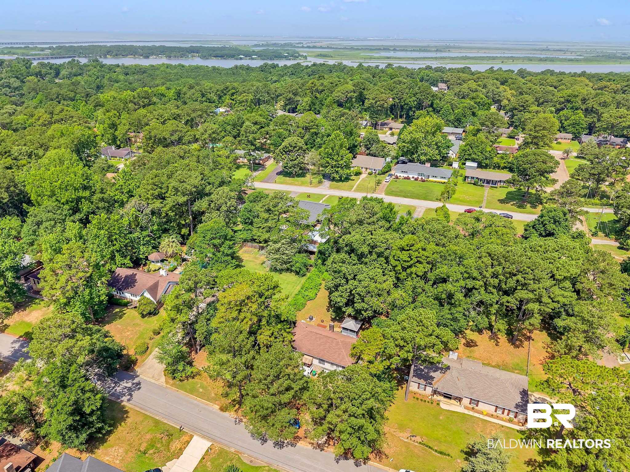 45 Caisson Trace Spanish Fort, AL 36527 - Photo 40 of 46 Drone / aerial view of a large body of water and a forest