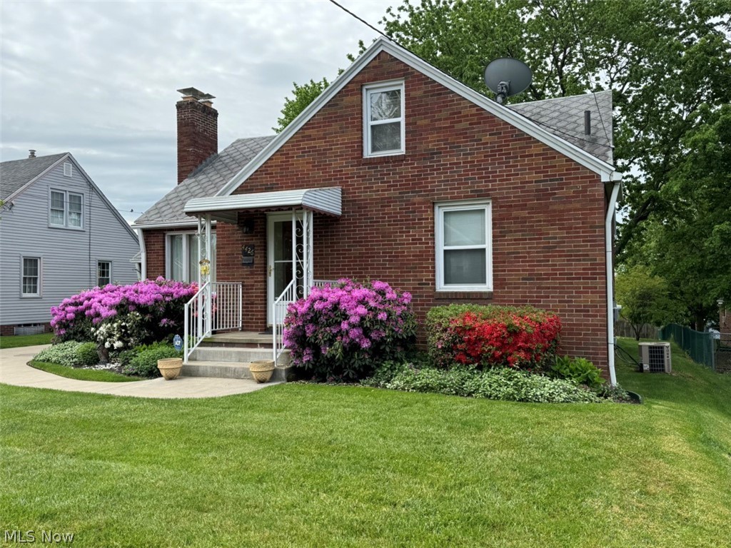 4426 2nd Street Northwest Canton, OH 44708 - Photo 2 of 20 Bungalow-style house featuring a front yard