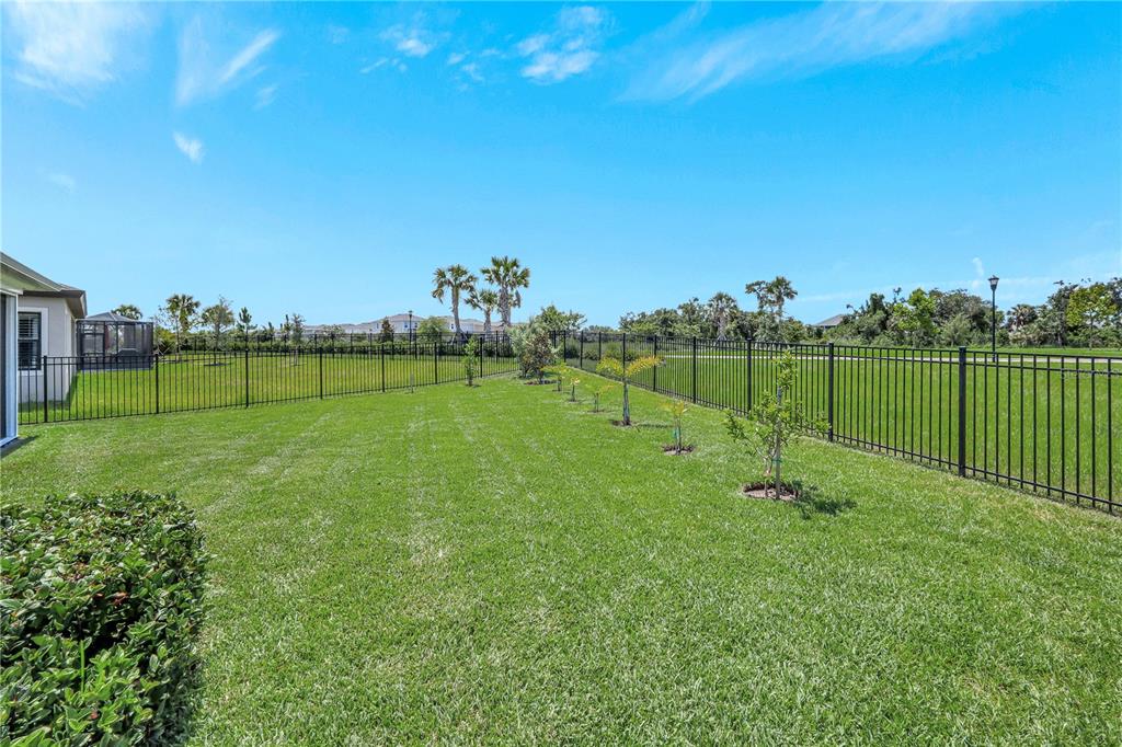 6219 Golden Nettle Drive Apollo Beach, FL 33572 - Photo 25 of 37 a view of a golf course with a lake
