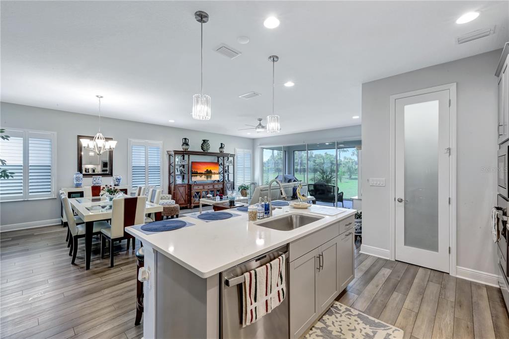 6219 Golden Nettle Drive Apollo Beach, FL 33572 - Photo 7 of 37 a view of a dining room with furniture window and outside view