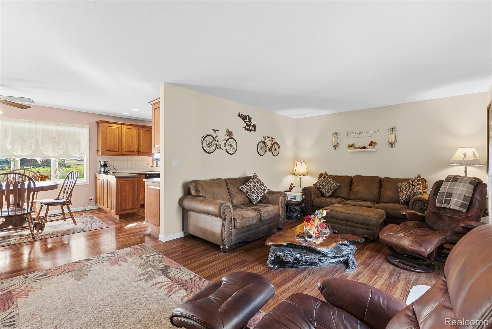 2227 North Graf Road Caro, MI 48723 - Photo 18 of 51 Wood-finish flooring throughout, with a dining area featuring a ceiling fan