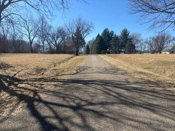 a view of yard covered with snow
