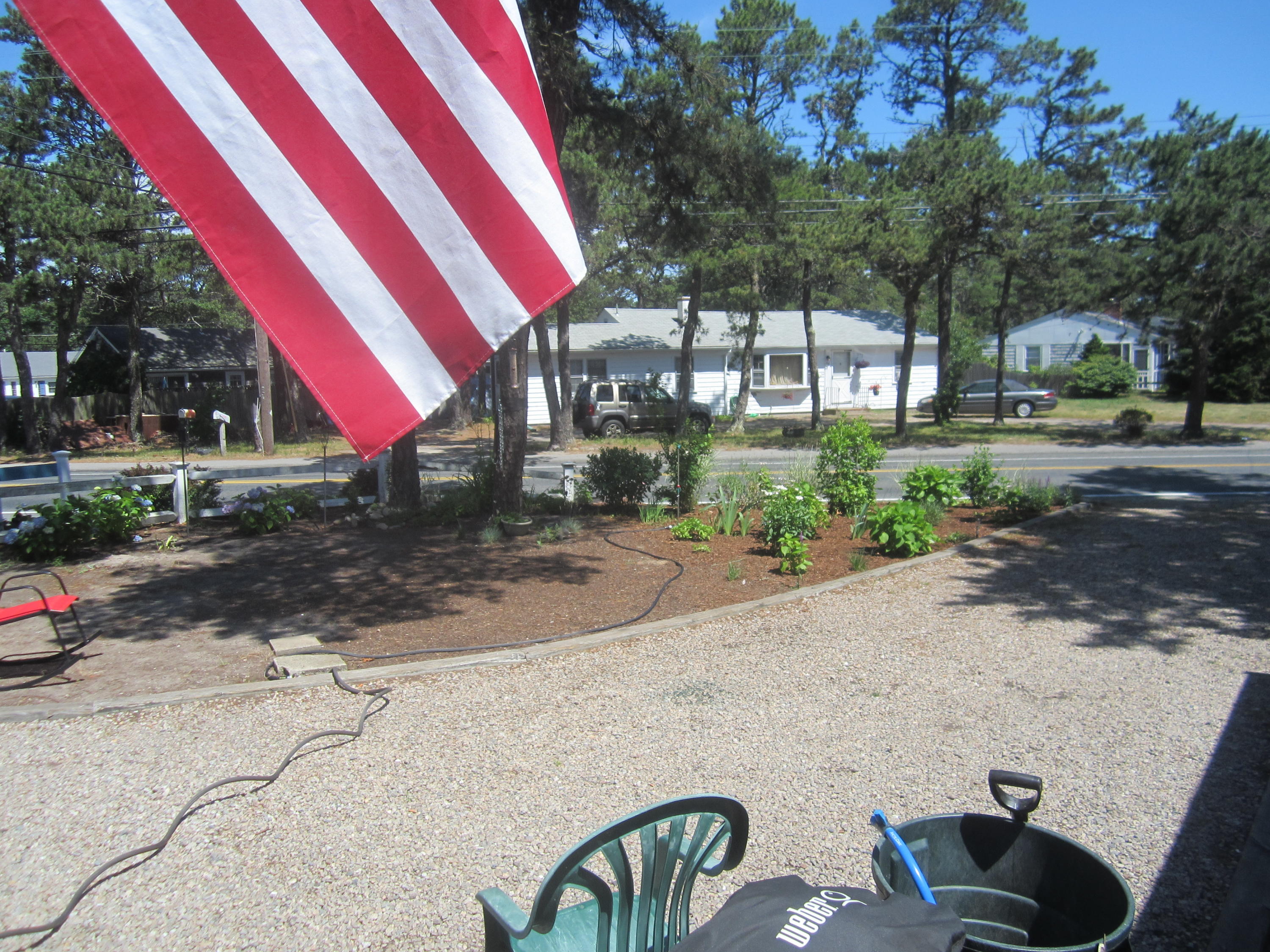 101 Lower County Road, Unit U1A Dennis Port, MA 02639 - Photo 5 of 10 a view of a street with sitting area