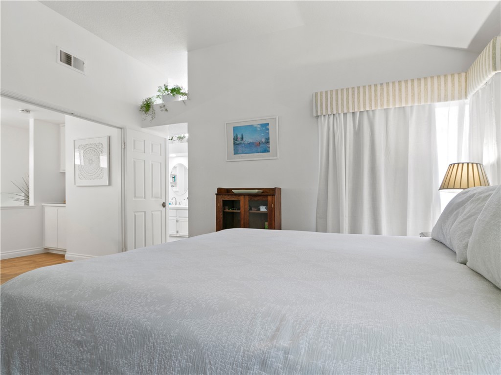 24822 Cutter Laguna Niguel, CA 92677 - Photo 26 of 49 a bed room with a bed and a painting