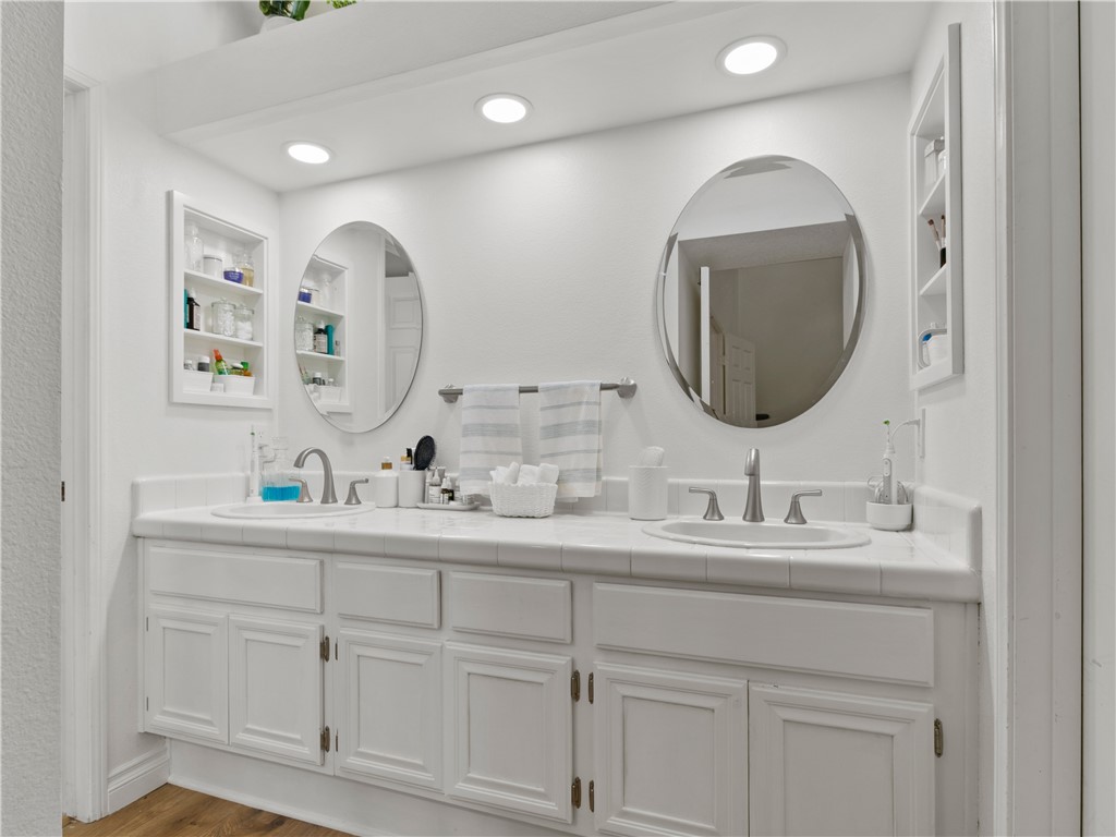 24822 Cutter Laguna Niguel, CA 92677 - Photo 27 of 49 a bathroom with a double vanity sink and a mirror