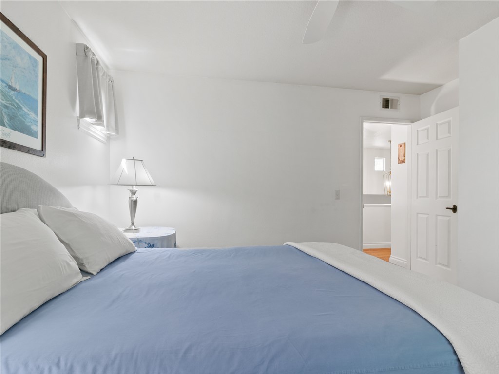 24822 Cutter Laguna Niguel, CA 92677 - Photo 34 of 49 a bedroom with a bed and a lamp