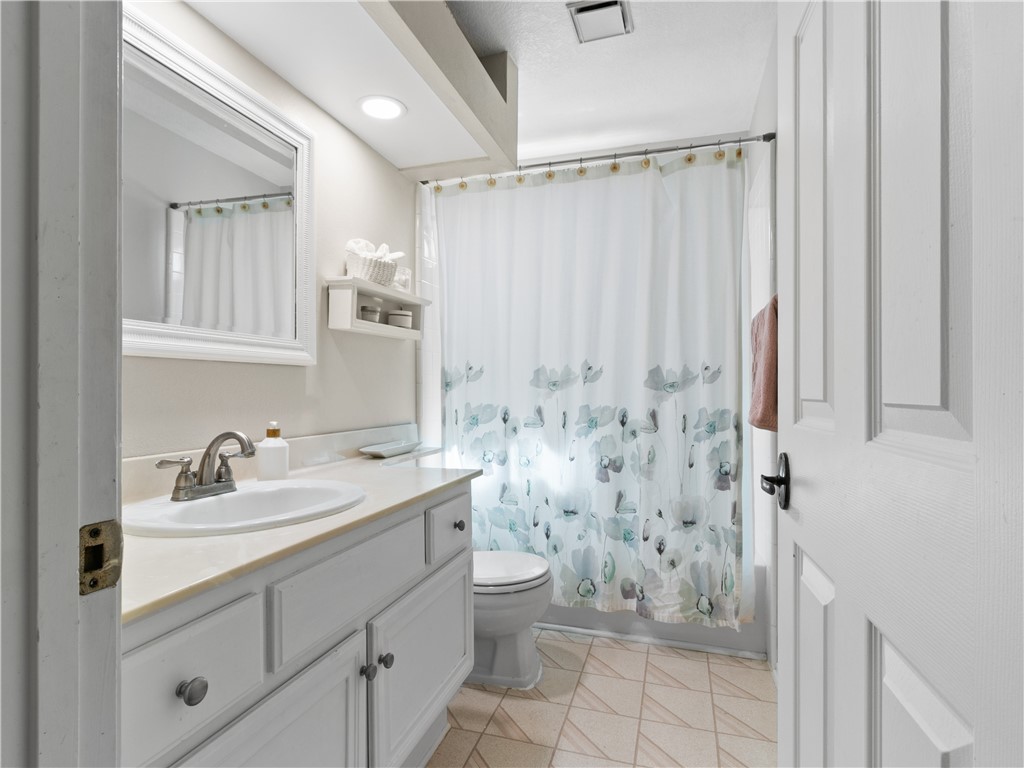 24822 Cutter Laguna Niguel, CA 92677 - Photo 35 of 49 a bathroom with a sink a toilet and shower