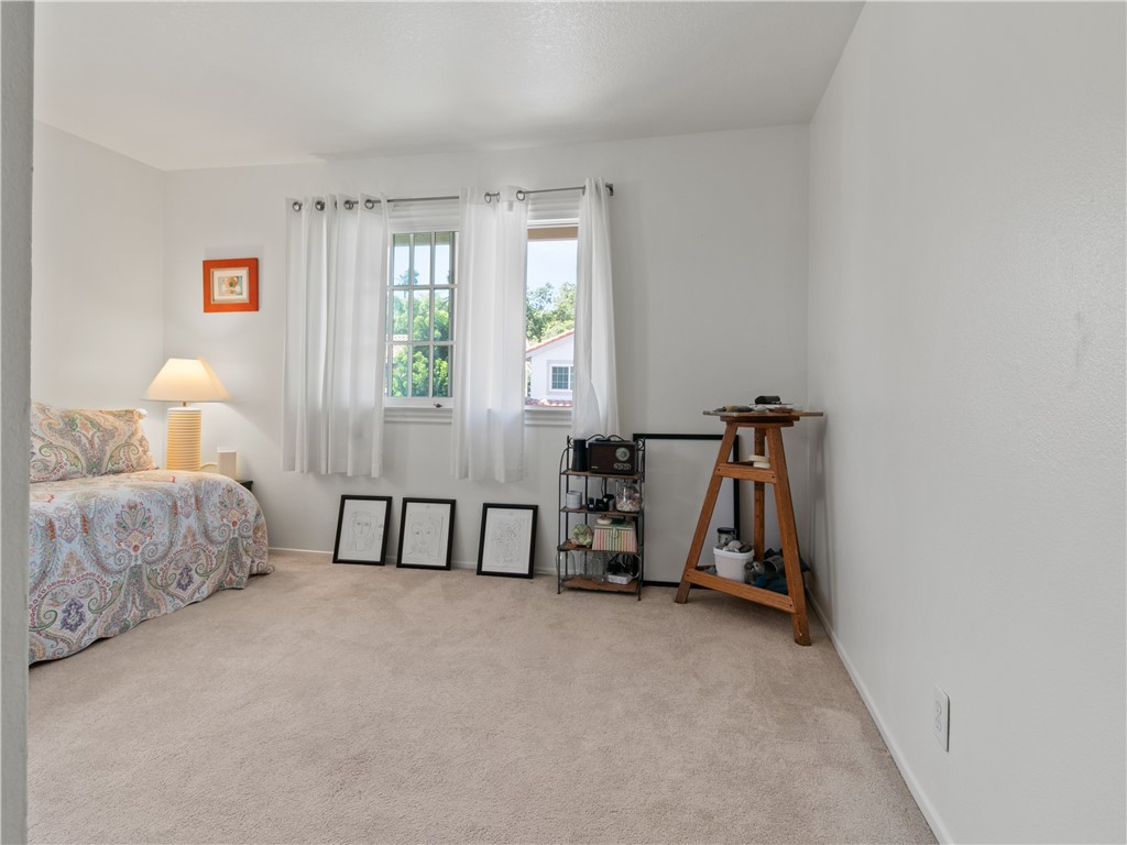 24822 Cutter Laguna Niguel, CA 92677 - Photo 36 of 49 a bedroom with bed and a window