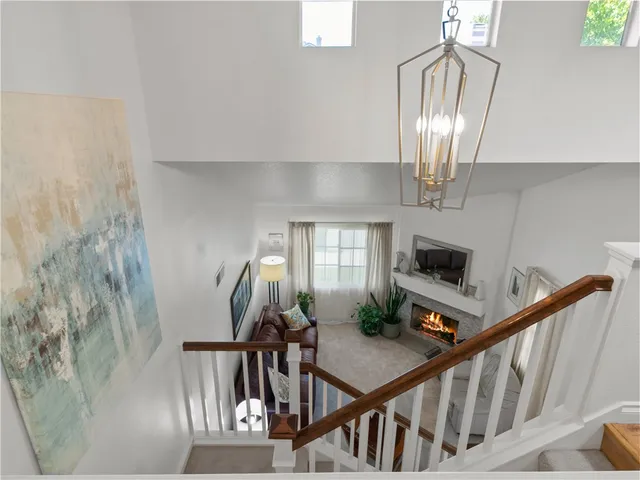 a view of a livingroom with furniture stairs
