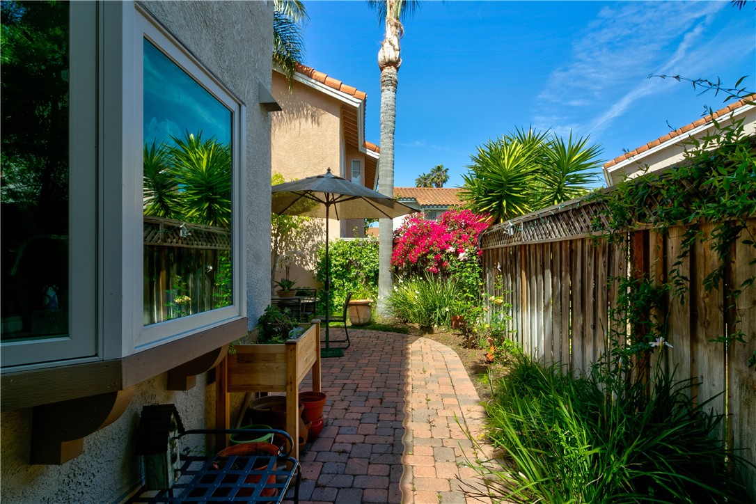 24822 Cutter Laguna Niguel, CA 92677 - Photo 44 of 49 a view of a house with a yard and potted plants
