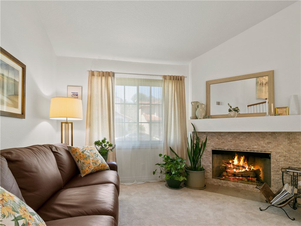 24822 Cutter Laguna Niguel, CA 92677 - Photo 6 of 49 a living room with furniture and a fireplace