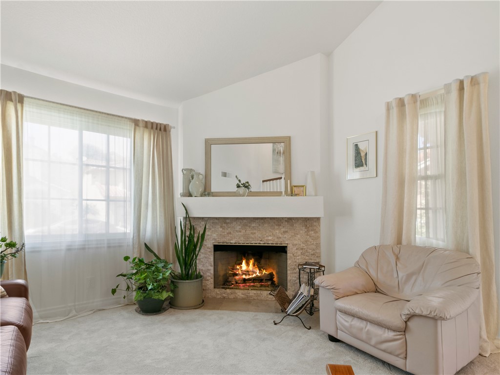 24822 Cutter Laguna Niguel, CA 92677 - Photo 7 of 49 a living room with furniture and a fireplace