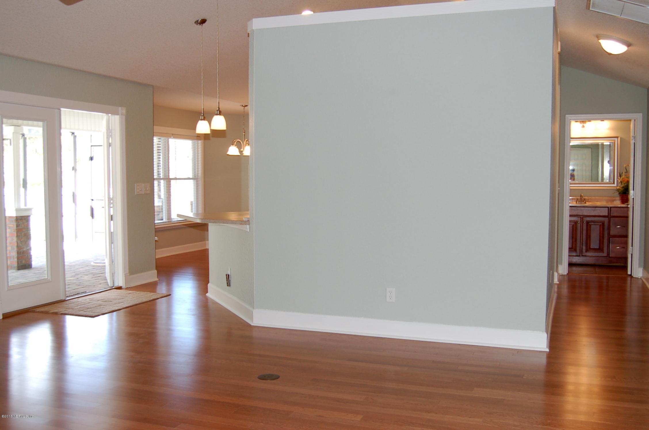 2122 Anniston Road Jacksonville, FL 32246 - Photo 8 of 32 Great room to kitchen