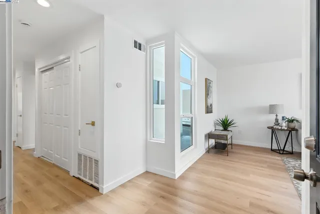 a view of livingroom with furniture and entryway