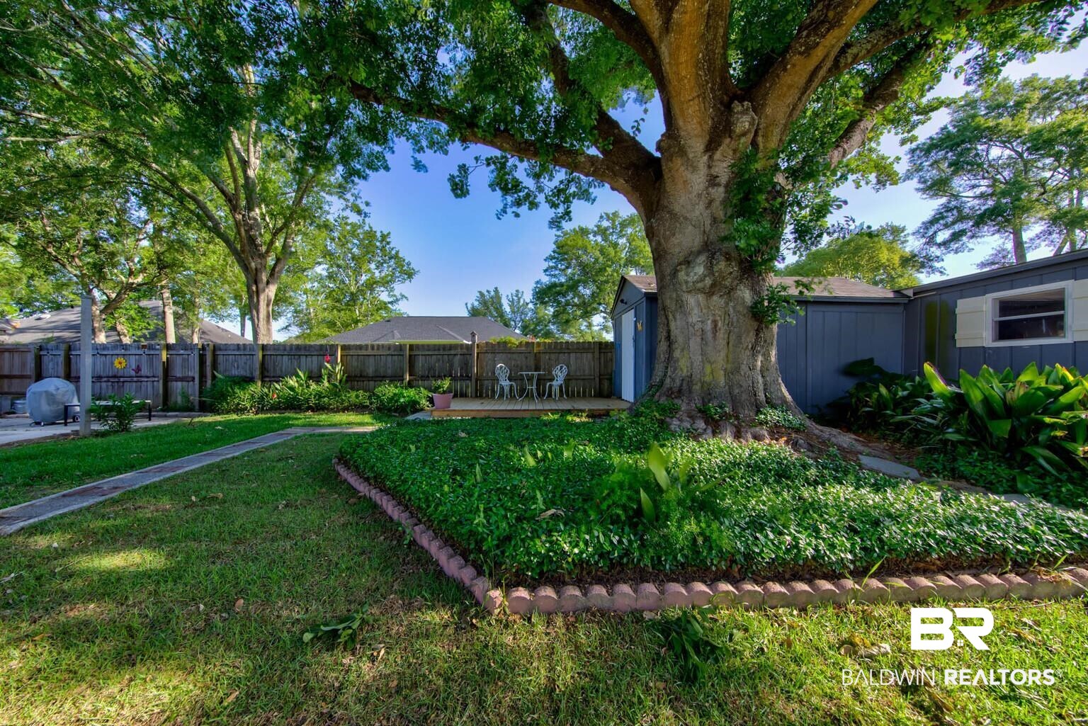 304 West Palm Avenue Foley, AL 36535 - Photo 18 of 18 View of yard with a patio area