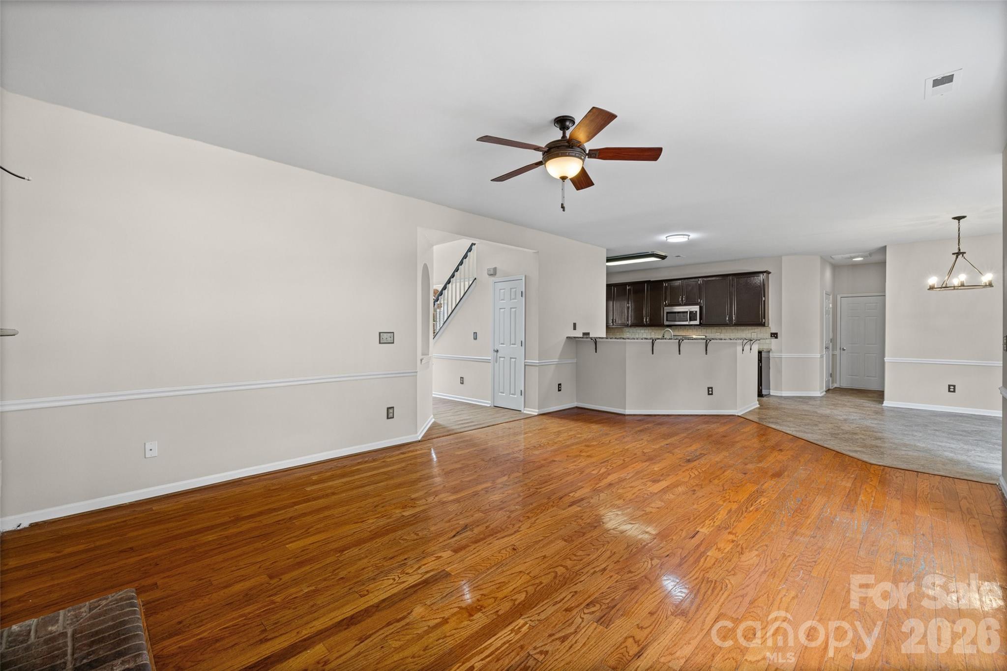 620 East Cheval Drive Fort Mill, SC 29708 - Photo 12 of 48 a view of a big room with wooden floor and cabinet