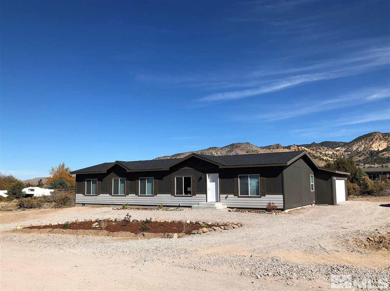 15380 Tuxon Way Reno, NV 89521 - Photo 2 of 25 a view of a yard in front of house