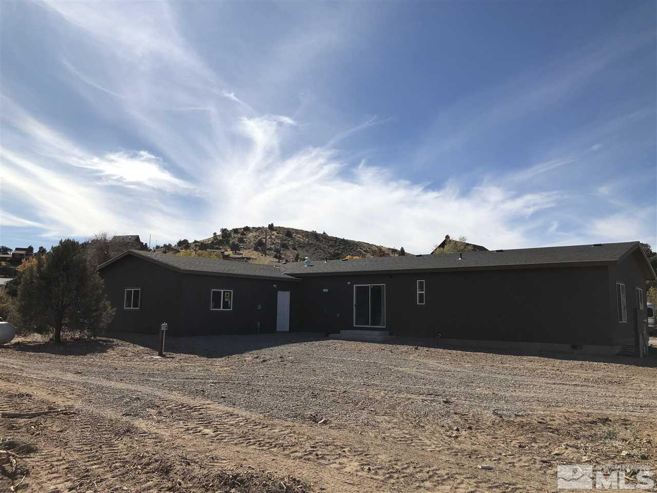 15380 Tuxon Way Reno, NV 89521 - Photo 5 of 25 a view of a house with a roof yard