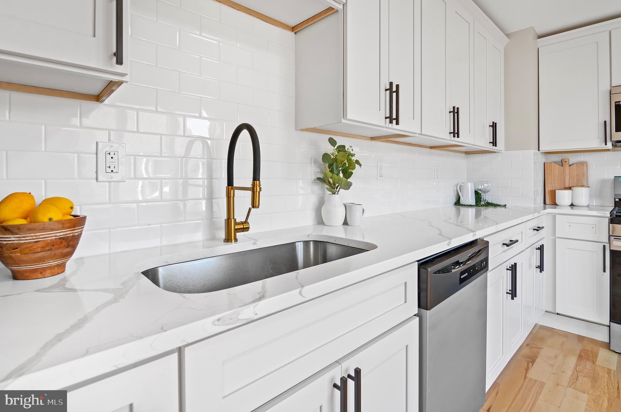 1237 Willow Road Dundalk, MD 21222 - Photo 18 of 29 a view of a kitchen with sink and cabinets